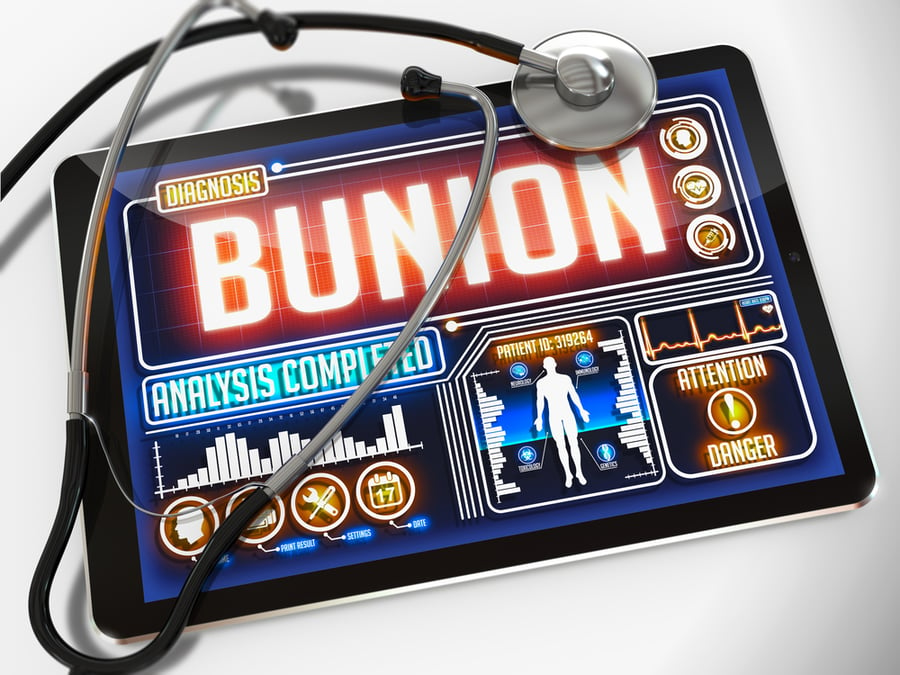 Bunion - Diagnosis on the Display of Medical Tablet and a Black Stethoscope on White Background.