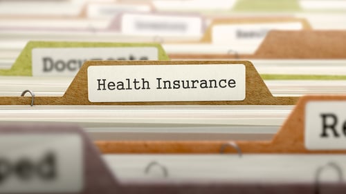 Health Insurance - Folder Register Name in Directory. Colored, Blurred Image. Closeup View.