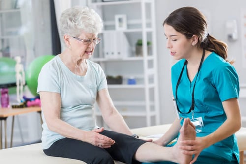 Older lady visiting the podiatrist.