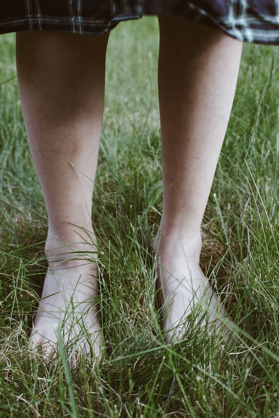 picture of feet standing in grass