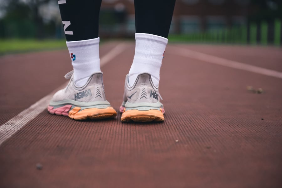 person wearing running shoes